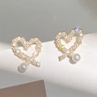 Fashionable autumn and winter new style heart earrings new trend Korean style peach heart earrings for women Western style hot imitation pearl earrings