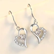  2024 new style trendy heart earrings Korean temperament long style net red earrings round face slimming earrings