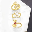Clearance European and American creative personality dragonfly flower ring niche design super flash love zircon ring rir56