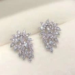Source manufacturers wholesale exquisite maple leaf-shaped geometric earrings fashionable women's dazzling earrings earrings