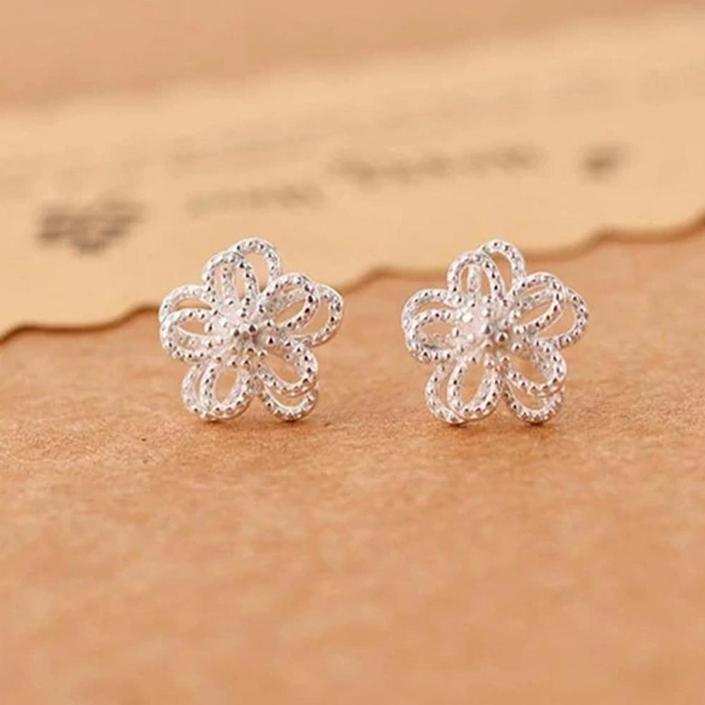  Artistic forest sweet hollow flower earrings Korean style simple small fresh earrings wholesale hot sale