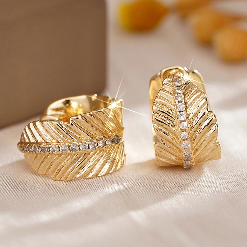 Live hot sale earrings for women with leaf-shaped micro-inlaid zircon imitation gold accessories, French elegant ladies' jewelry