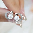 Summer niche design star and moon earrings star and moon pearl earrings Korean Dongdaemun small accessories