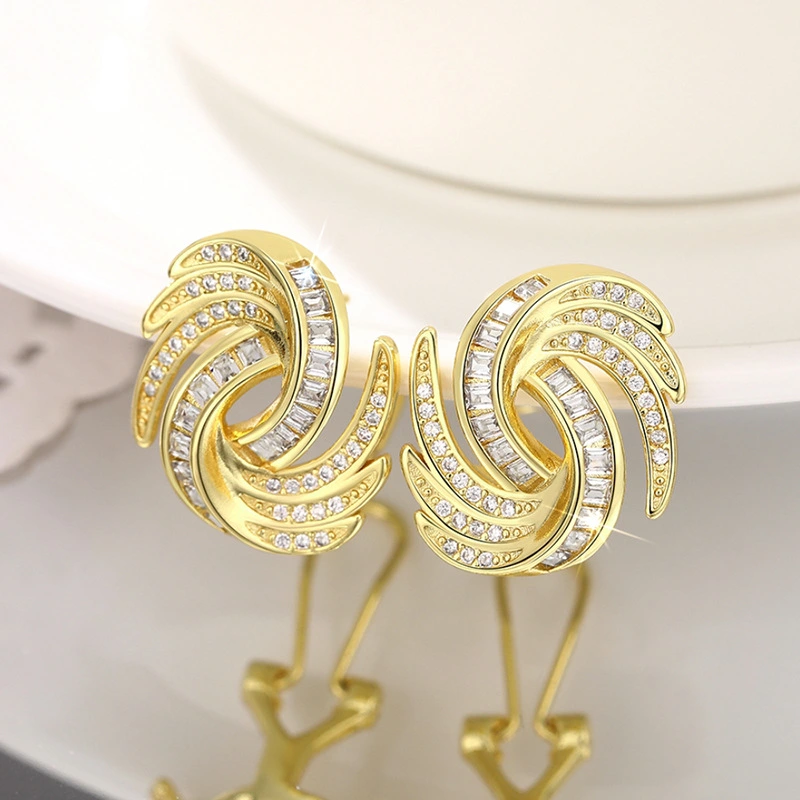  Metal micro-inlaid design earrings for women, personalized niche zircon jewelry, vortex eye-catching light luxury style jewelry