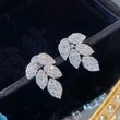 Factory direct sales of creative luxury leaf zircon earrings with copper micro-inlaid zircon for women