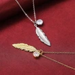 New Bohemian retro feather pendant necklace female creative tassel personality sweater chain