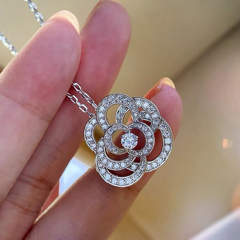 Bright camellia ring earrings design sense light luxury jewelry set fashion temperament ring earrings for women