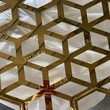 Laser cut gold polished partition