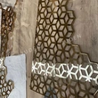 Laser cut gold polished partition