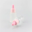 transparent frosted glass lotion bottle with gold pump cap for liquid foundation