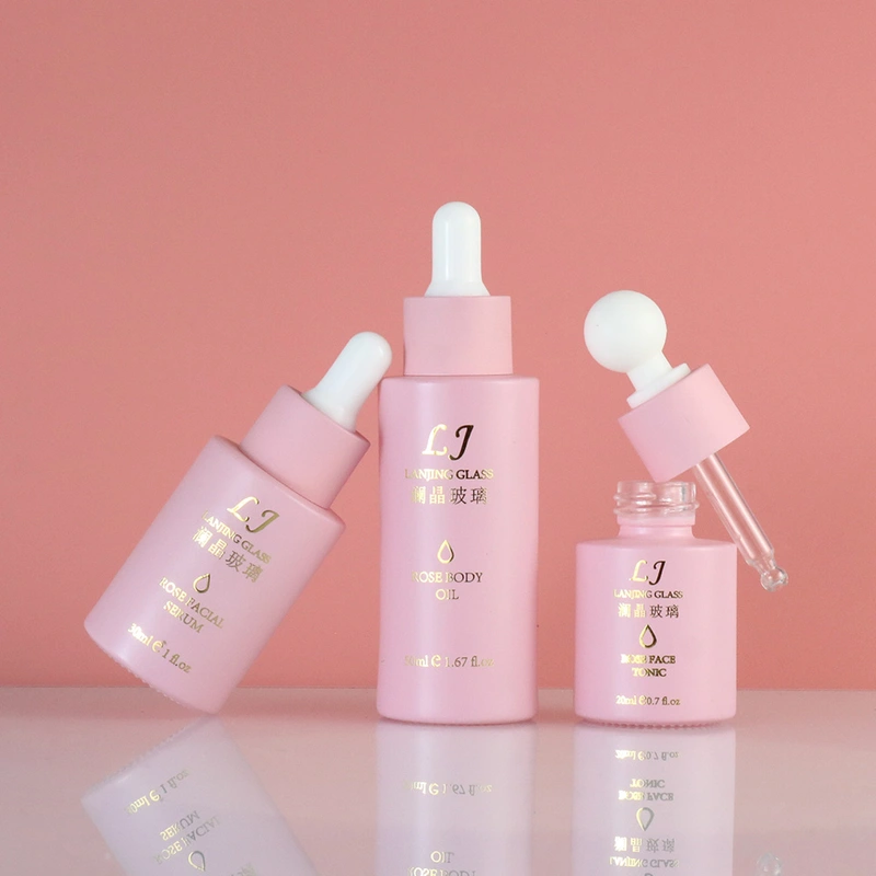 pink cosmetic round perfume glass  pump spray  bottle and cream jar