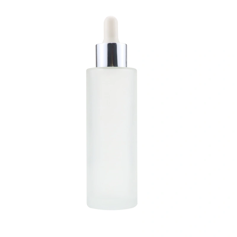 Factory wholesale Skincare Liquid packaging set white cosmetic glass bottle with silver cap