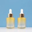 wholesale colorful serum flat shoulder dropper oil glass bottles