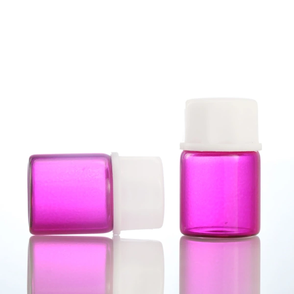 Face massage essential oil or eye cream glass vial with dropper cap