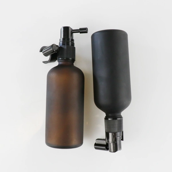 empty essential oil  glass bottles with spray cap