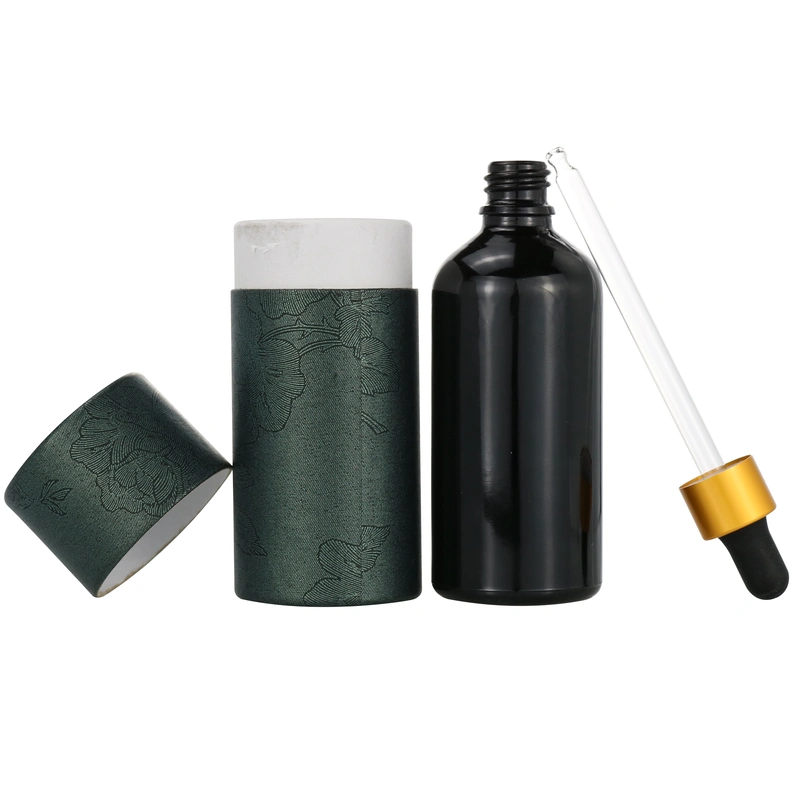empty essential oil dropper glass bottle with paper tube