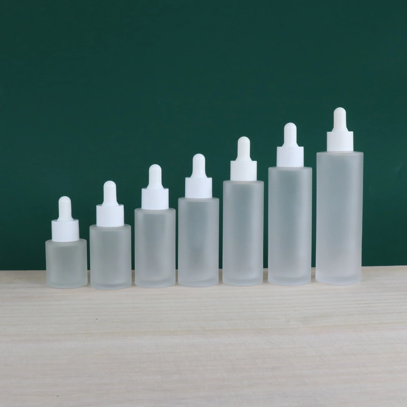 cosmetic 1oz empty serum lotion pump glass bottle and jar set