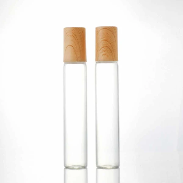 Transparent glass perfume roll on bottles with plastic bamboo cap