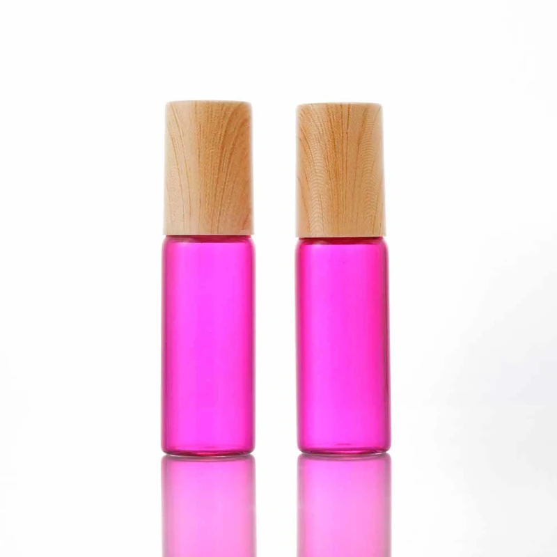 blue glass perfume roll on bottles with plastic bamboo cap