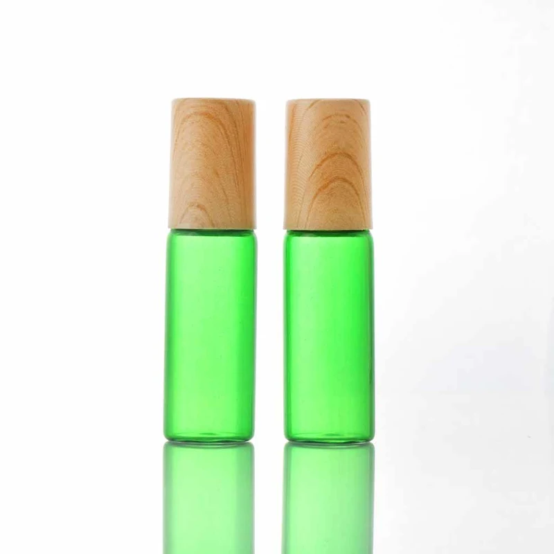 blue glass perfume roll on bottles with plastic bamboo cap