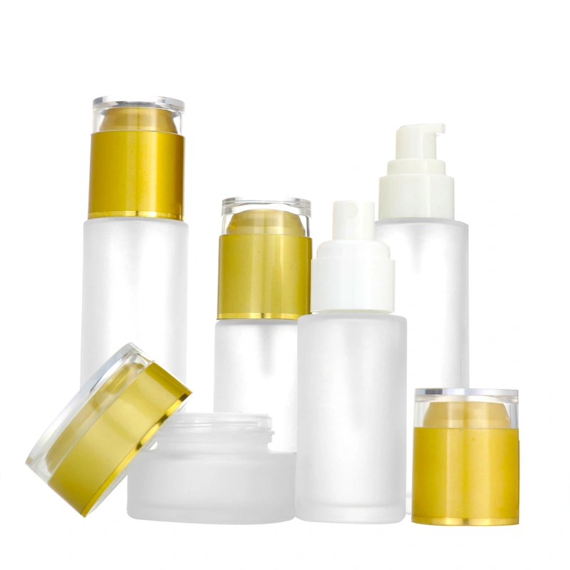 Luxury wholesale100ml cosmetic glass lotion bottles with gold pump