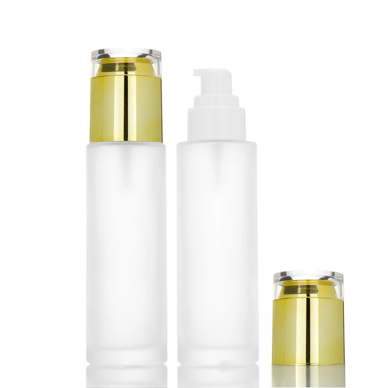Luxury wholesale100ml cosmetic glass lotion bottles with gold pump