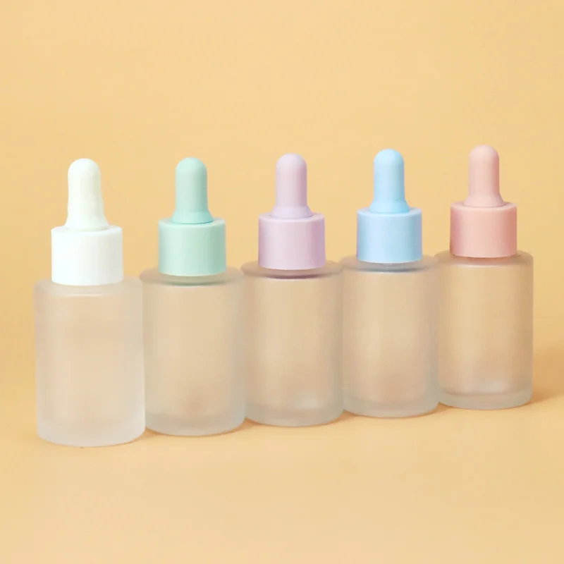 Colourful cream  glass bottle jar set with pump and dropper lid