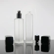  black skincare cosmetic glass bottle set with pump lotion cap 