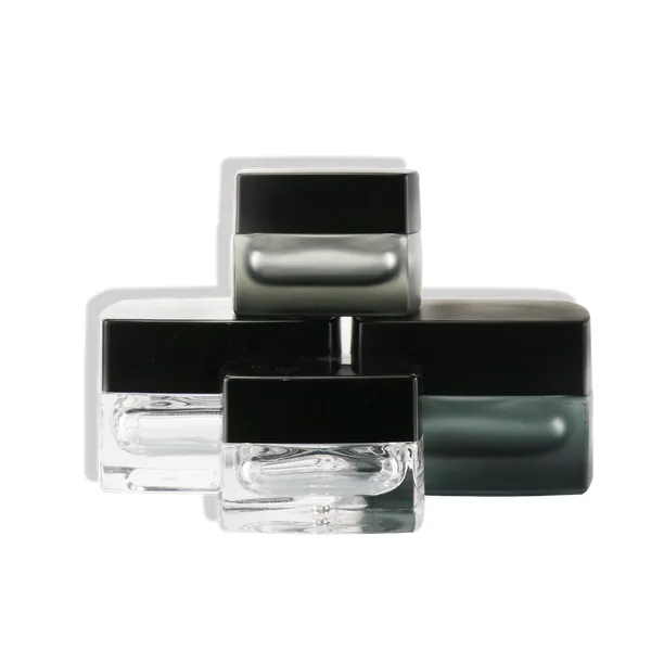 empty square clear cosmetic face lotion cream glass bottle jar