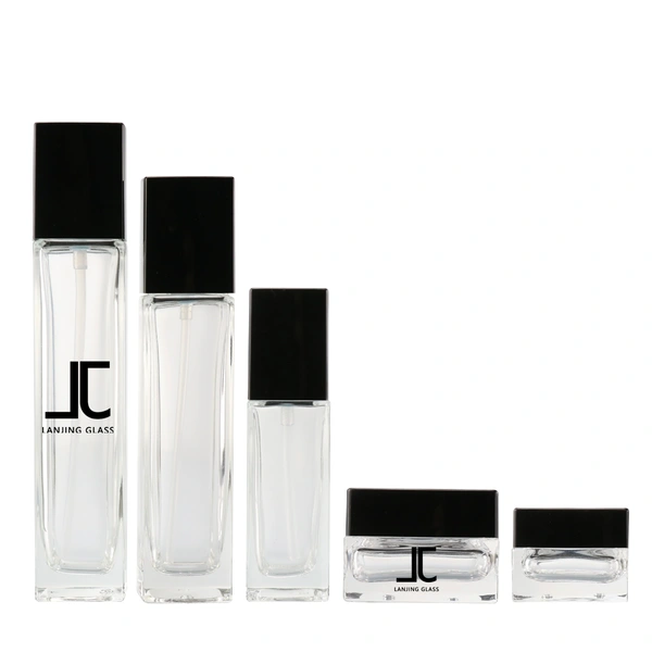 black skincare cosmetic glass bottle set with pump lotion cap