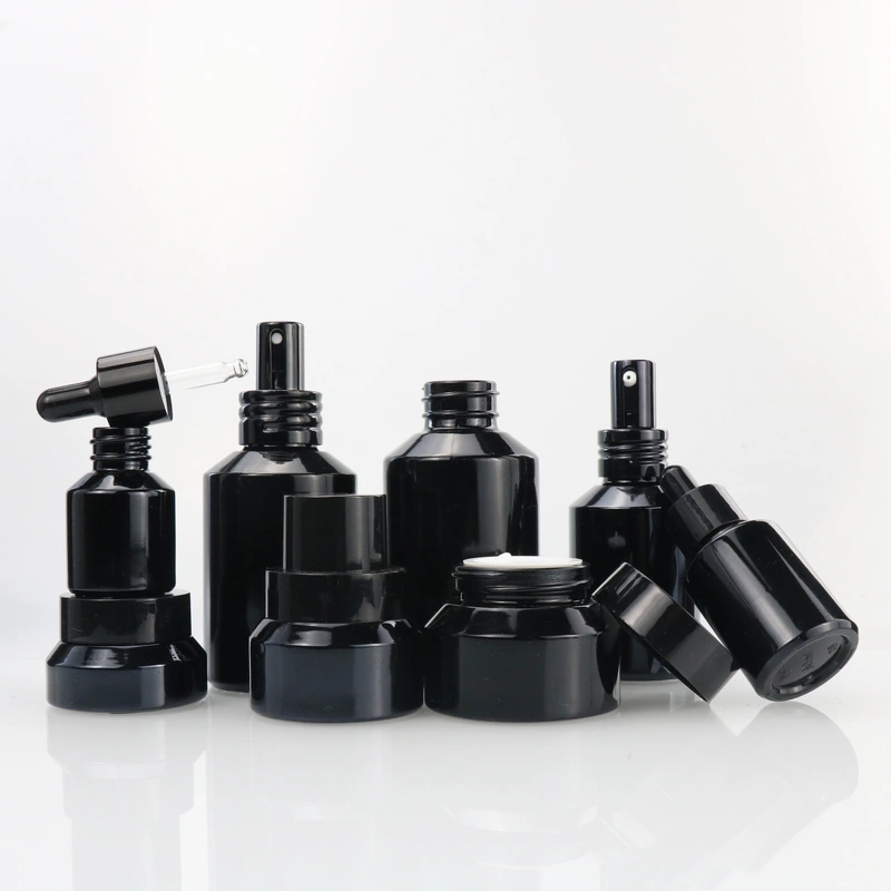 black skincare cosmetic glass bottle set with pump lotion sprayer cap