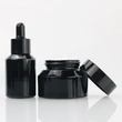 black skincare cosmetic glass bottle set with pump lotion sprayer cap