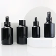 black skincare cosmetic glass bottle set with pump lotion sprayer cap