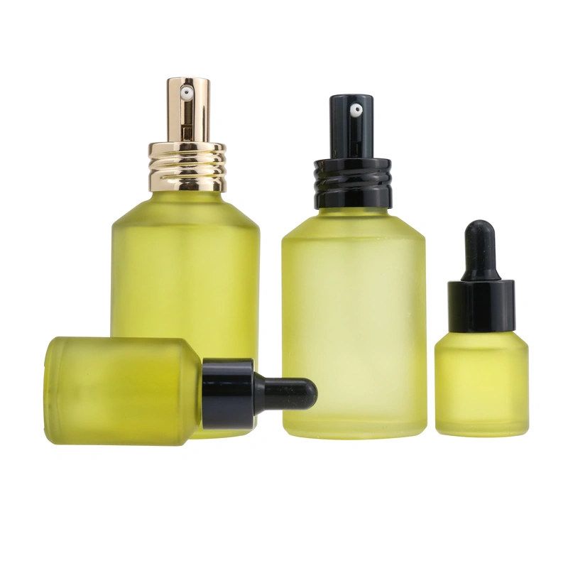 black skincare cosmetic glass bottle set with pump lotion cap