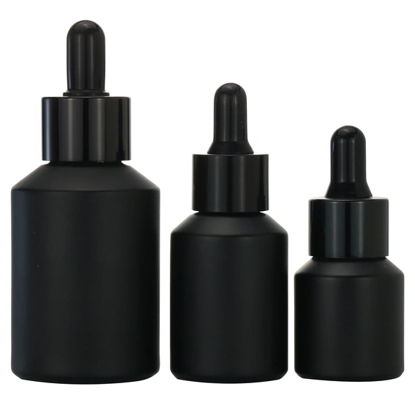 black skincare cosmetic glass dropper bottle with black cap