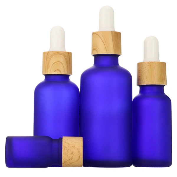 clear frosted glass dropper bottle and cosmetic bottle with bamboo lid
