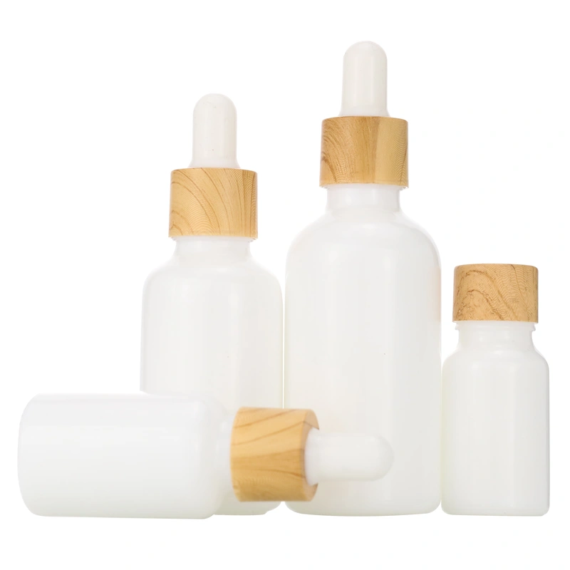 clear frosted glass dropper bottle and cosmetic bottle with bamboo lid
