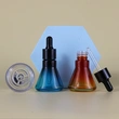 unique shape glass dropper bottle with black cap cosmetic packaging 