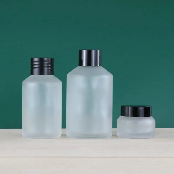 100ml 200ml glass oil pump bottle and jar for cosmetic packaging set