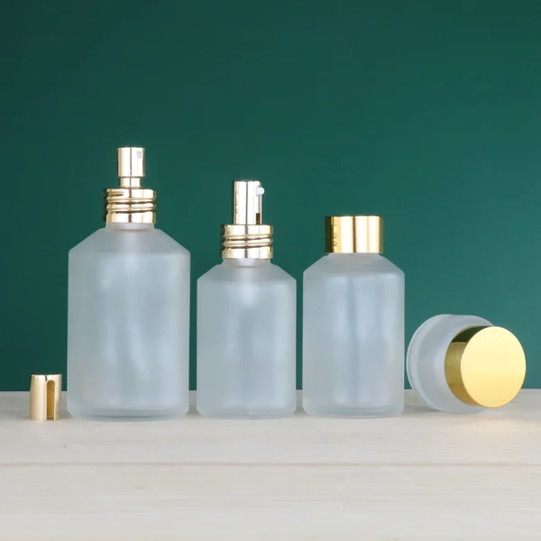 skincare glass pump bottle and glass jar for cosmetic packaging 100ml