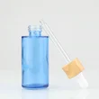 cosmetic package glass essential oil serum glass bamboo dropper bottle
