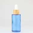 cosmetic package glass essential oil serum glass bamboo dropper bottle