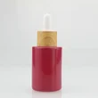 White essential oil serum glass dropper bottle with bamboo cap