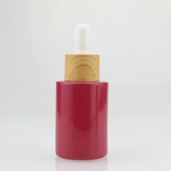 White essential oil serum glass dropper bottle with bamboo cap