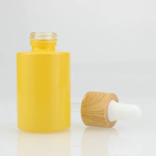 White essential oil serum glass dropper bottle with bamboo cap