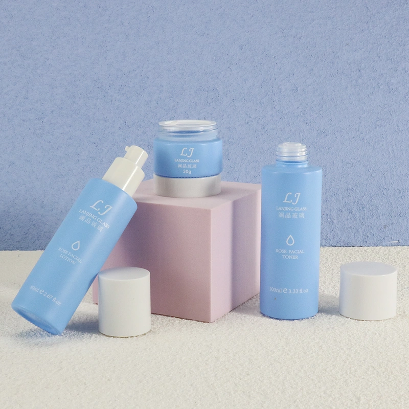 Cleaning products refillable container empty blue glass spray bottle