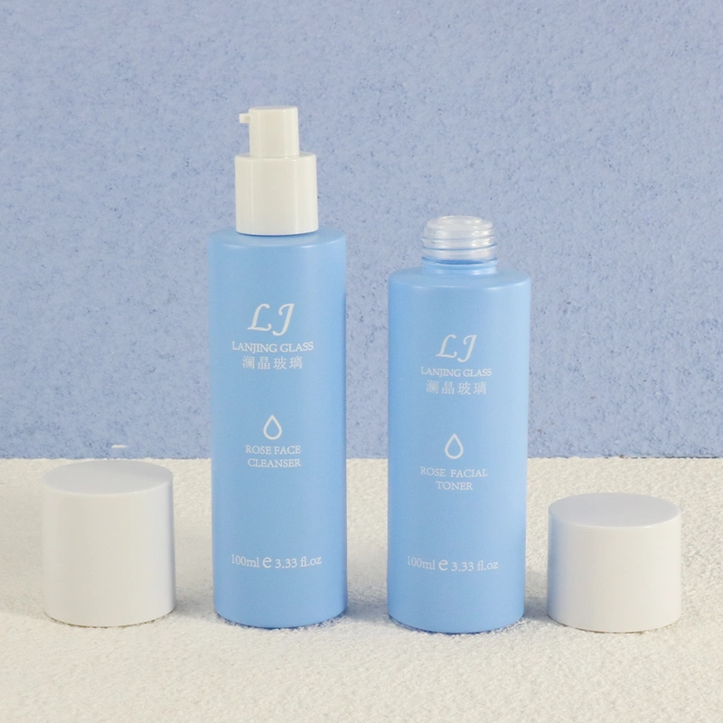 Cleaning products refillable container empty blue glass spray bottle