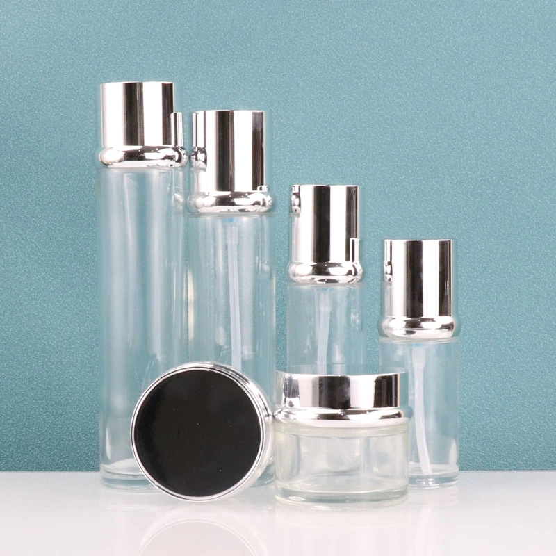 Luxury custom skincare packaging clear cosmetic glass bottle set