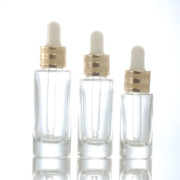 oil dropper bottle  transparent glass bottle  gold lid glass bottle