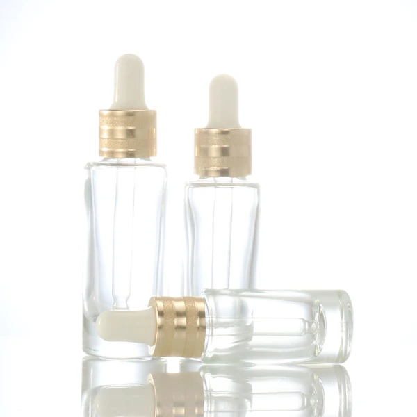 oil dropper bottle  transparent glass bottle  gold lid glass bottle